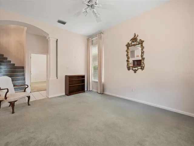 a kitchen with a sink a stove and cabinets