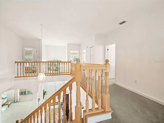 a view of storage and utility room with washer and dryer