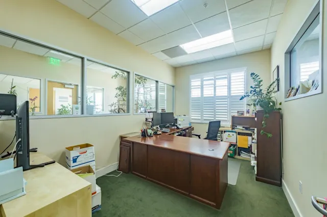 a kitchen with stainless steel appliances a refrigerator sink and cabinets