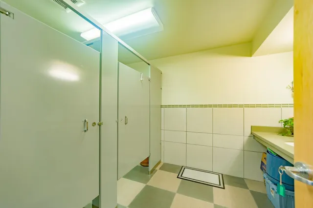 a kitchen with a table and chairs