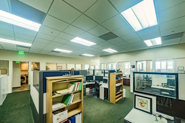 a front view of a house with parking space