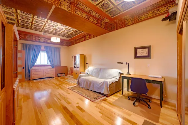 a view of a livingroom with couch and a window