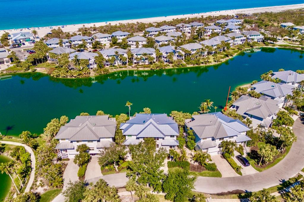 760 Seaboard Line Lane Boca Grande, FL 33921 - Photo 25 of 71 an aerial view of residential houses with outdoor space and swimming pool