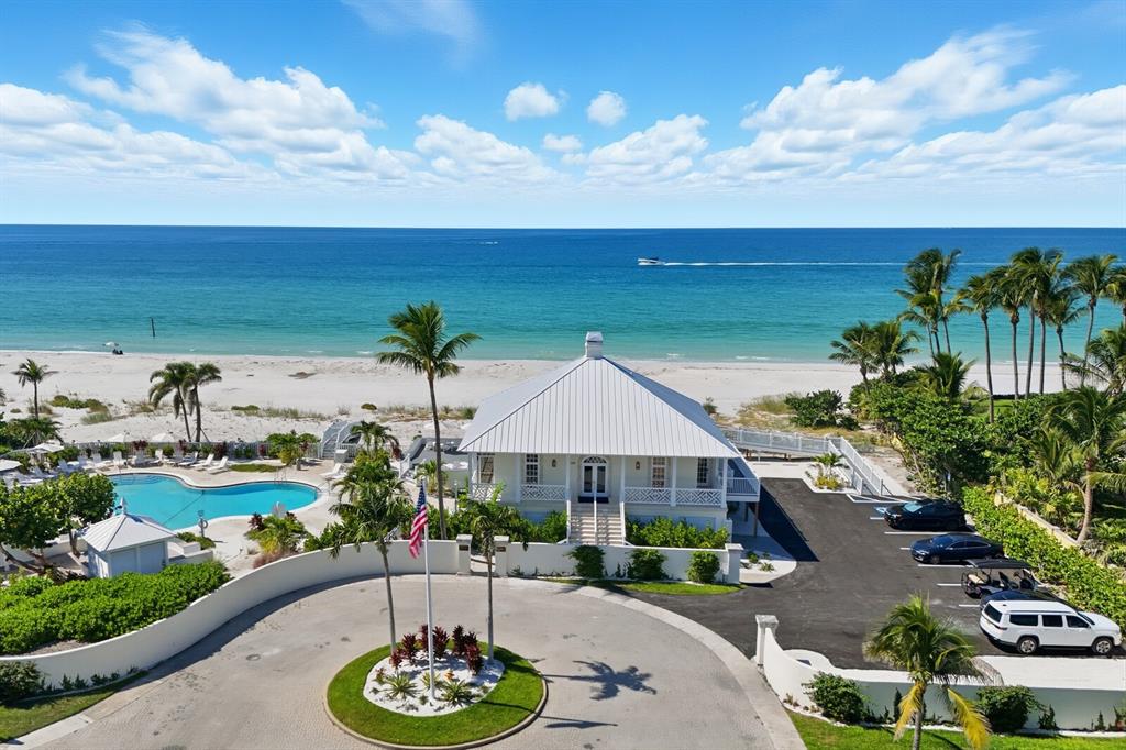 760 Seaboard Line Lane Boca Grande, FL 33921 - Photo 26 of 71 a view of a patio with table and chairs potted plants