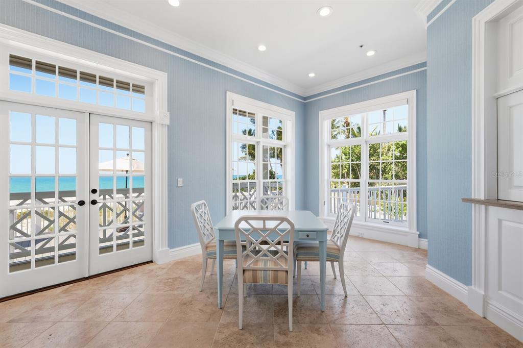 760 Seaboard Line Lane Boca Grande, FL 33921 - Photo 34 of 71 a view of a dining room with furniture and chandelier
