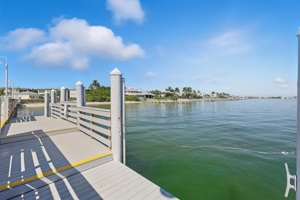 760 Seaboard Line Lane Boca Grande, FL 33921 - Photo 41 of 71 a view of a lake with sitting space and garden view