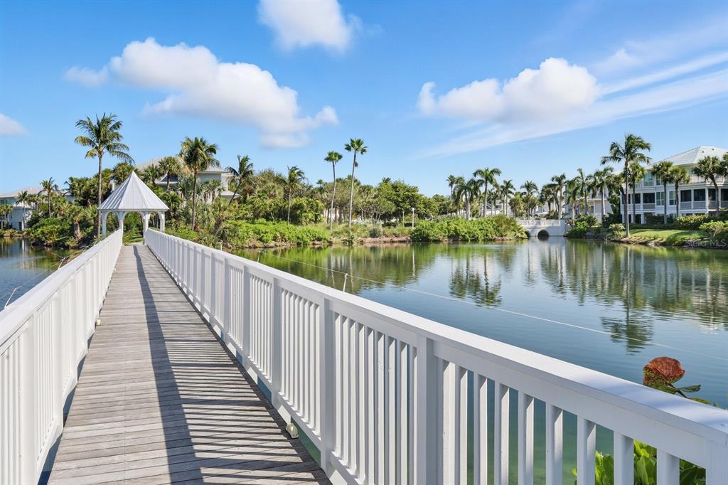 760 Seaboard Line Lane Boca Grande, FL 33921 - Photo 48 of 71 a view of a lake from a balcony
