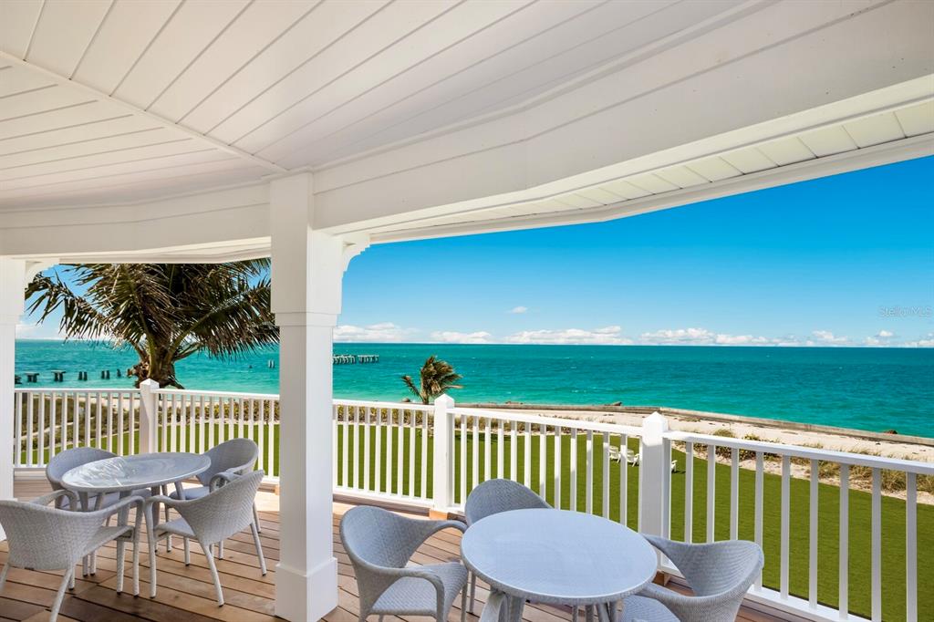 760 Seaboard Line Lane Boca Grande, FL 33921 - Photo 64 of 71 a view of a chair and tables