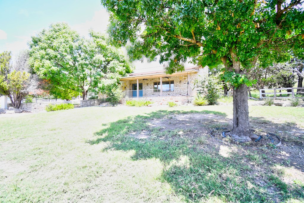155 B Nimitz Road Kerrville, TX 78028 - Photo 30 of 30 a front view of a house with a yard and trees