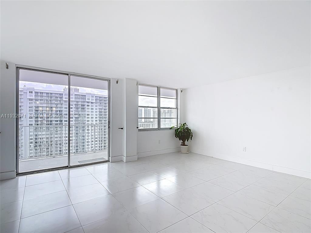 2801 Northeast 183rd Street, Unit 1504W Aventura, FL 33160 - Photo 27 of 57 an empty room with windows