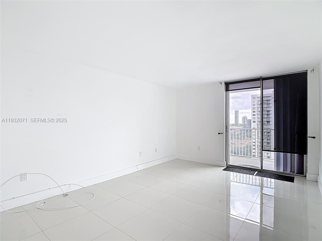 2801 Northeast 183rd Street, Unit 1504W Aventura, FL 33160 - Photo 30 of 57 an empty room with entrance