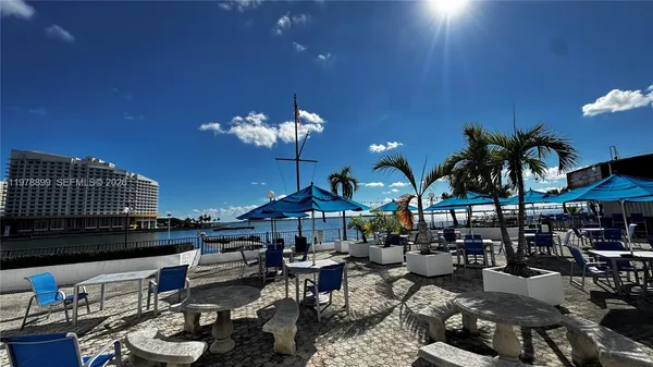a view of outdoor sitting area with furniture