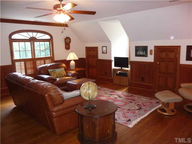 9916 Baileywick Road Raleigh, NC 27613 - Photo 13 of 25 a living room with furniture and wooden floor