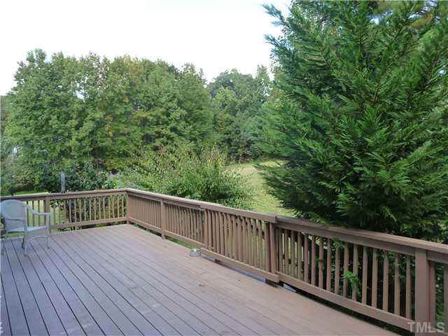 9916 Baileywick Road Raleigh, NC 27613 - Photo 25 of 25 a view of balcony with deck and trees