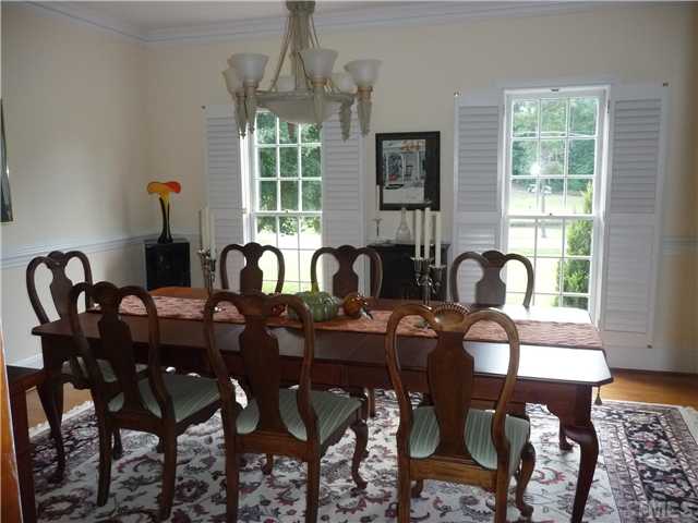 9916 Baileywick Road Raleigh, NC 27613 - Photo 8 of 25 a view of a dining room with furniture window and outside view