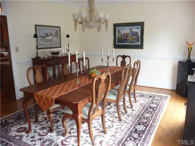 9916 Baileywick Road Raleigh, NC 27613 - Photo 9 of 25 a view of a dining room with furniture