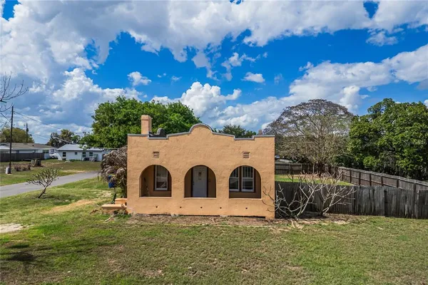 a house view with a garden space