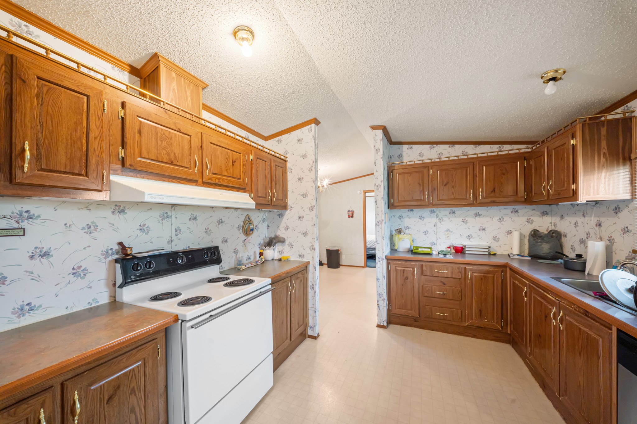 1777 Pond River Road Elkton, KY 42220 - Photo 11 of 21 a kitchen that has a sink and a stove in it