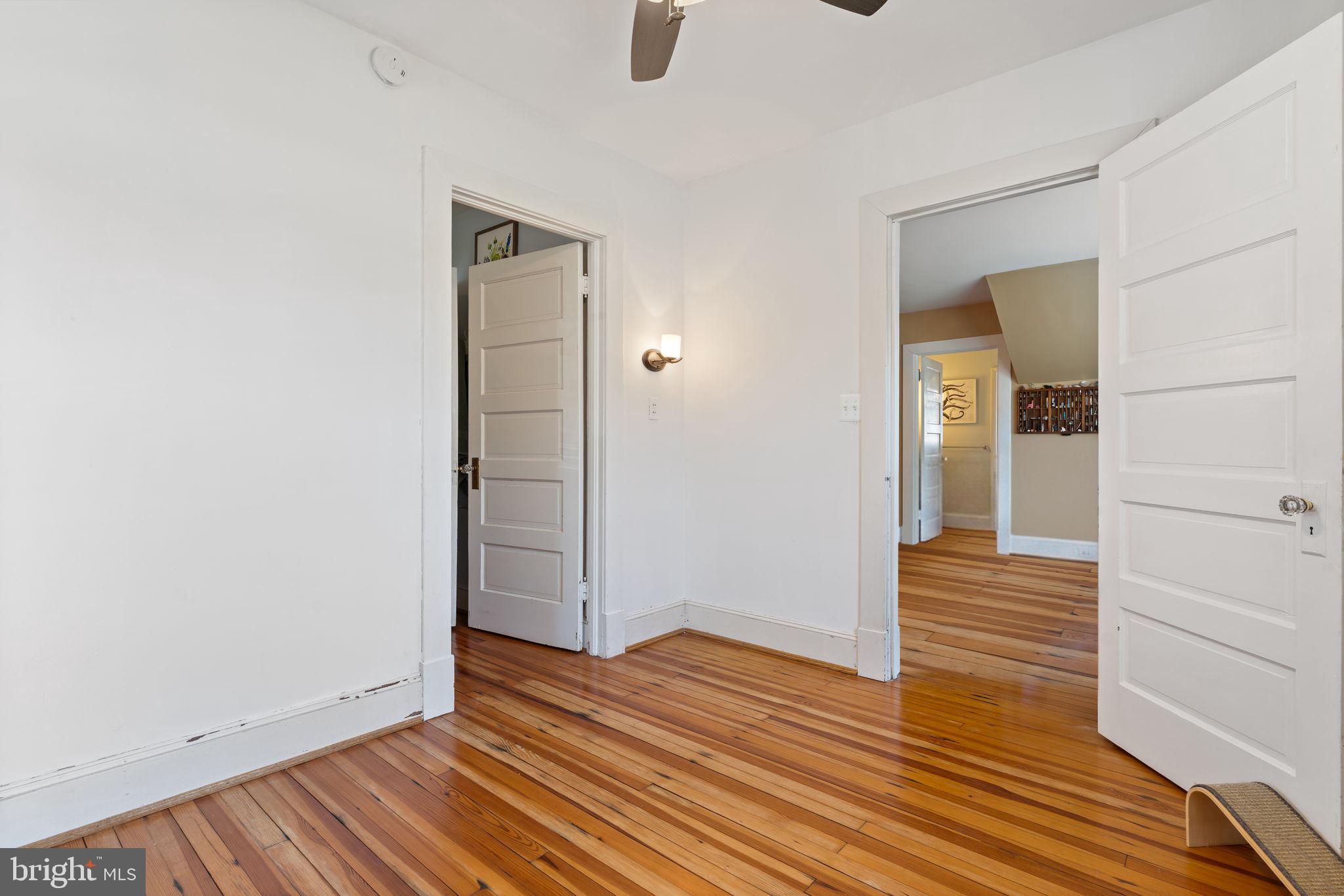 2844 Ridge Road Huntingtown, MD 20639 - Photo 21 of 47 wooden floor in an empty room