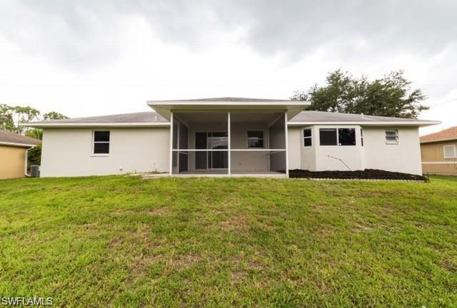 18513 Olive Road Fort Myers, FL 33967 - Photo 15 of 15 a view of a house with a backyard