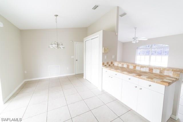 18513 Olive Road Fort Myers, FL 33967 - Photo 3 of 15 a bathroom with a granite countertop sink a mirror and a shower