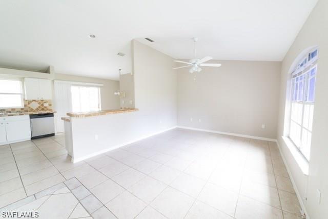 18513 Olive Road Fort Myers, FL 33967 - Photo 4 of 15 a view of a kitchen with a sink and a window