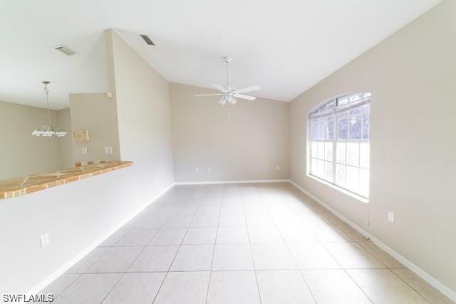 18513 Olive Road Fort Myers, FL 33967 - Photo 5 of 15 a view of an empty room with a window