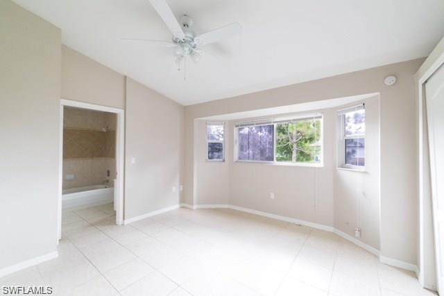 18513 Olive Road Fort Myers, FL 33967 - Photo 7 of 15 a view of an empty room with a window