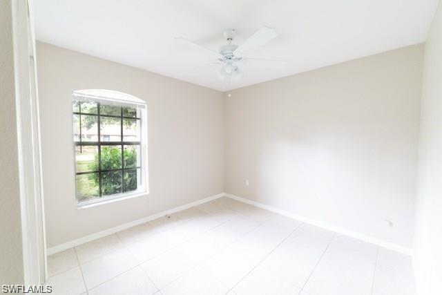 18513 Olive Road Fort Myers, FL 33967 - Photo 8 of 15 an empty room with a window