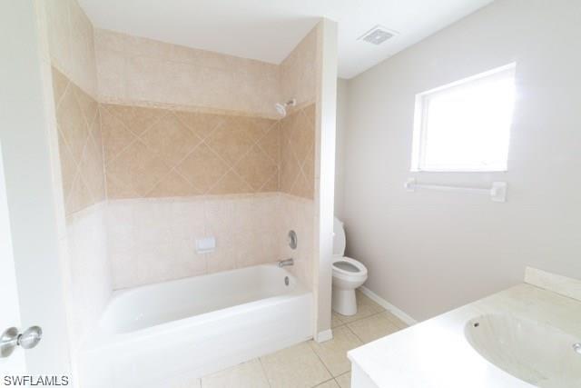 18513 Olive Road Fort Myers, FL 33967 - Photo 10 of 15 a bathroom with a bathtub and toilet