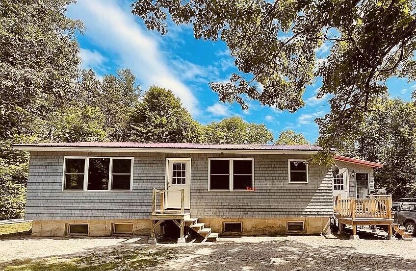 96 Main Road Burlington, ME 04417 - Photo 2 of 24 Front of house side of rode