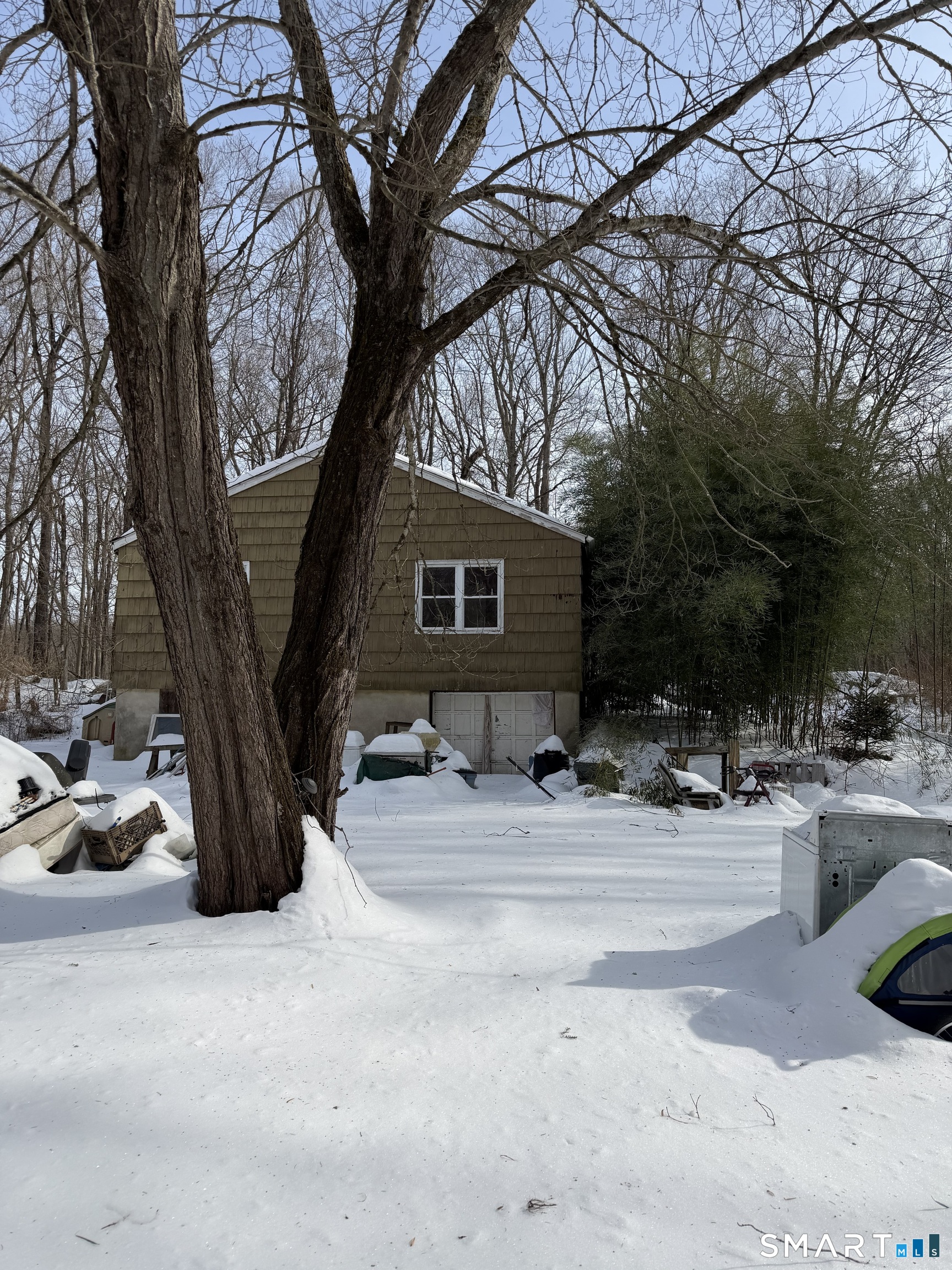 40 Towns End Road Newtown, CT 06470 - Photo 2 of 5 a view of backyard with table and chairs and a large tree