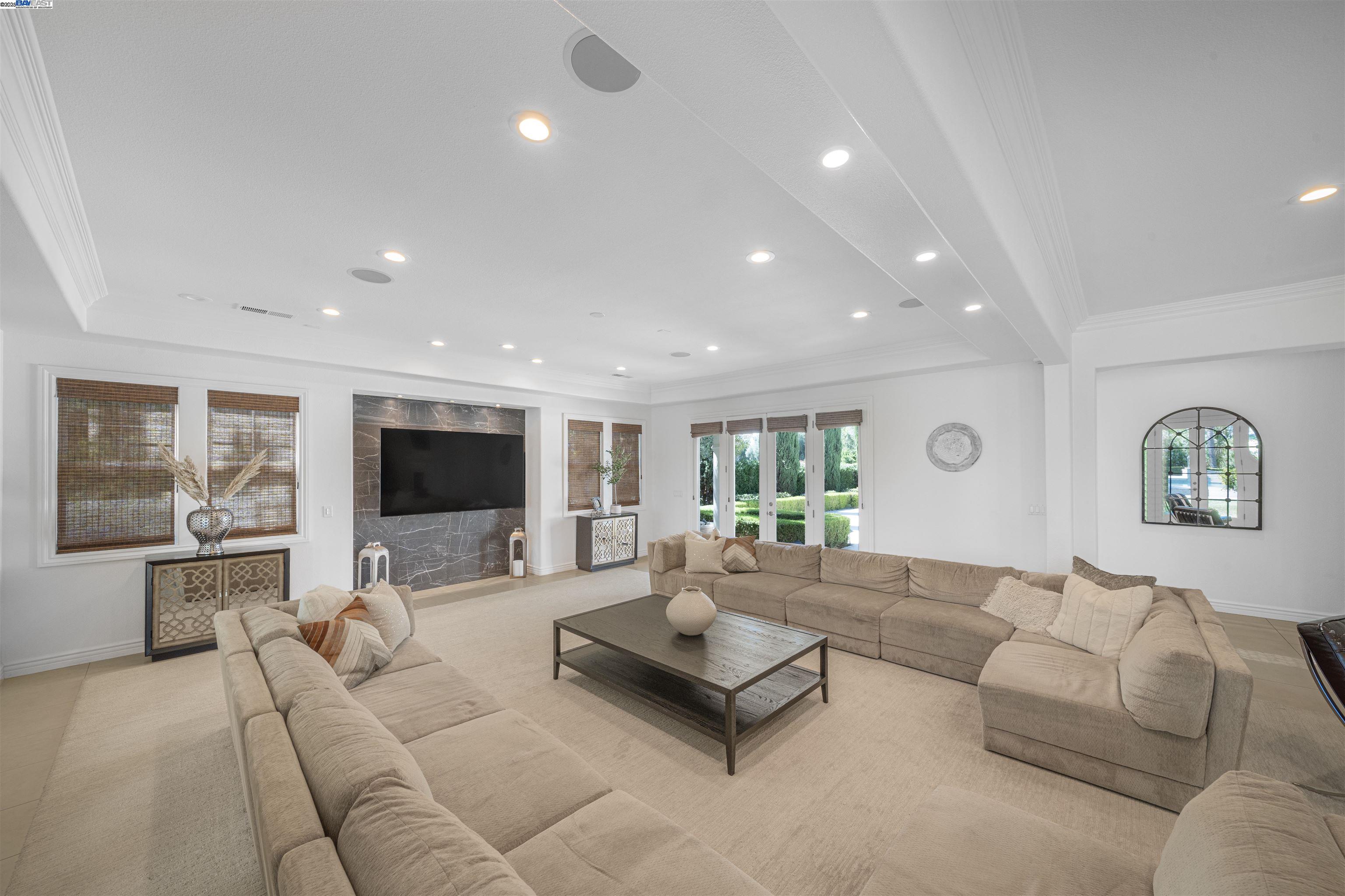 8324 Waterwell Way Tracy, CA 95304 - Photo 15 of 23 a living room with furniture and a flat screen tv