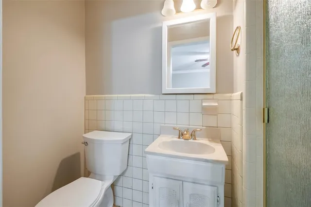 a bathroom with a sink and a toilet