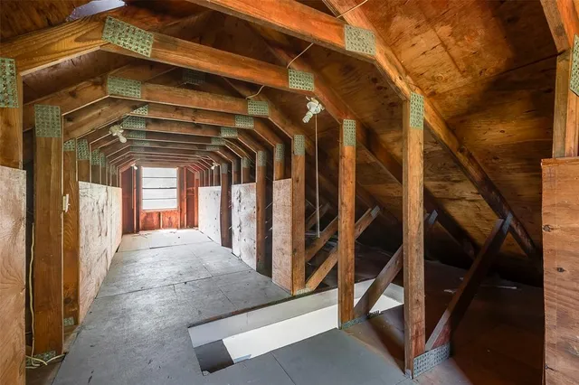 a view of a room with white walls