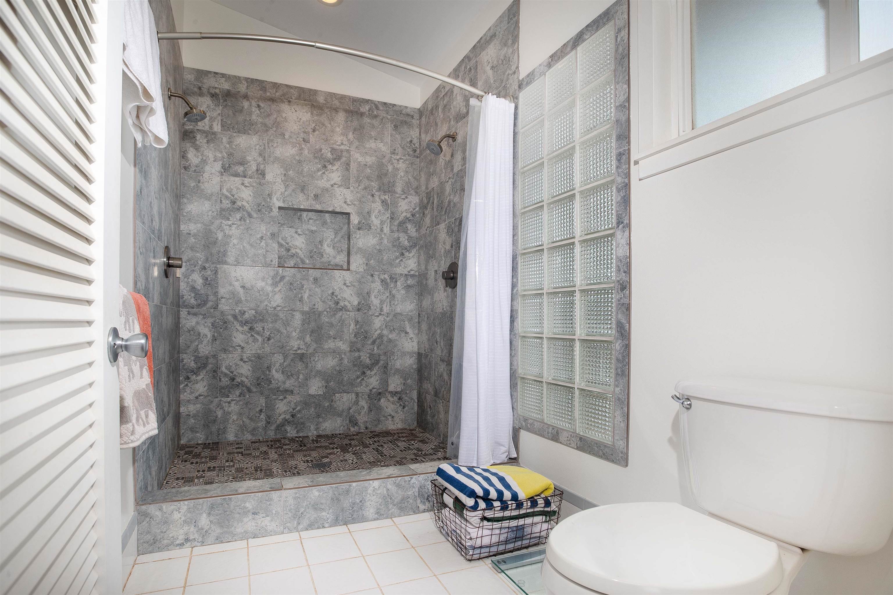 9 Kapii Place Haiku, HI 96708 - Photo 21 of 30 a bathroom with a shower and a toilet