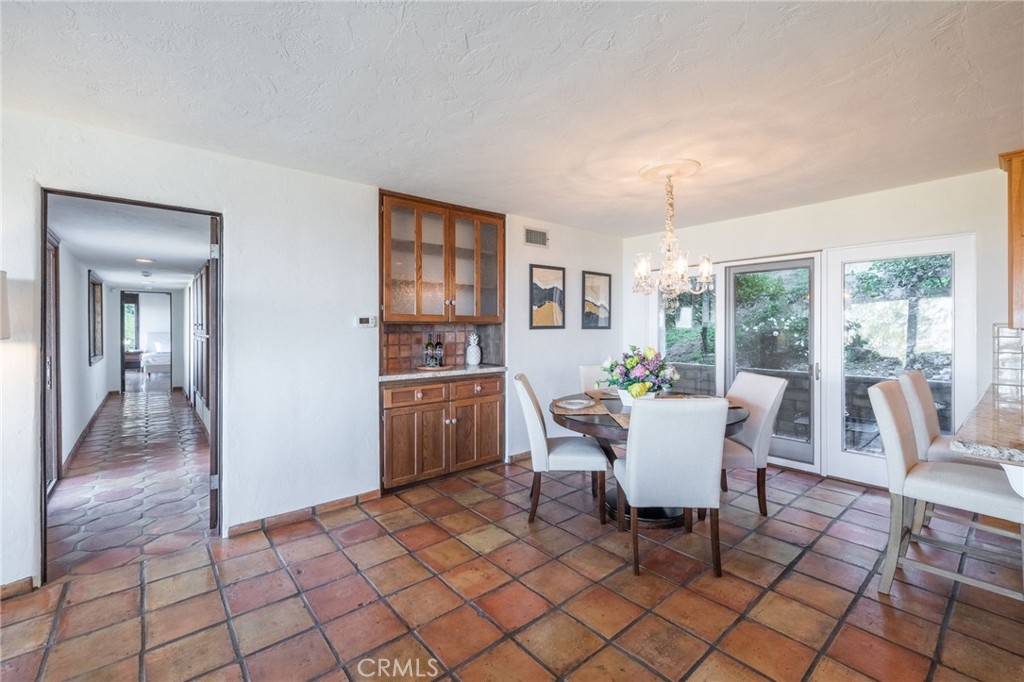 22 Deerhill Drive Rolling Hills Estates, CA 90274 - Photo 12 of 39 a dining room with furniture and window
