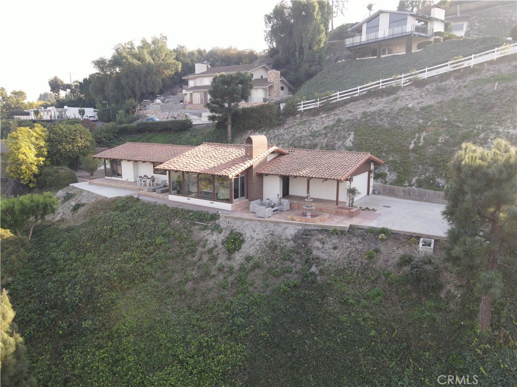 22 Deerhill Drive Rolling Hills Estates, CA 90274 - Photo 38 of 39 a front view of a house with garden