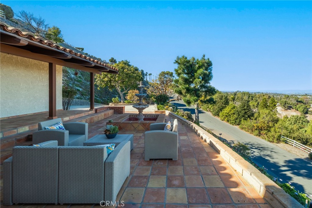 22 Deerhill Drive Rolling Hills Estates, CA 90274 - Photo 8 of 39 a view of balcony with furniture and city view