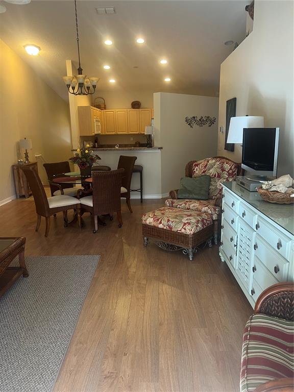 5373 Compass Point, Unit 1 Oxford, FL 34484 - Photo 13 of 38 a living room with furniture and a flat screen tv