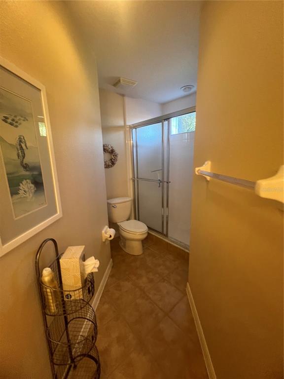 5373 Compass Point, Unit 1 Oxford, FL 34484 - Photo 20 of 38 a bathroom with a sink and mirror