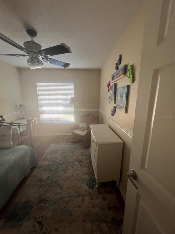 5373 Compass Point, Unit 1 Oxford, FL 34484 - Photo 24 of 38 a living room with furniture and a window