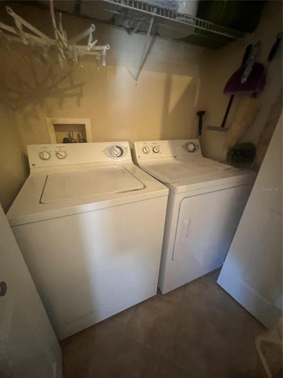 5373 Compass Point, Unit 1 Oxford, FL 34484 - Photo 26 of 38 a utility room with dryer and washer