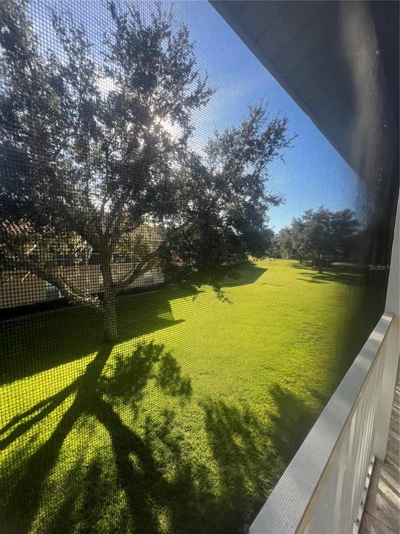 5373 Compass Point, Unit 1 Oxford, FL 34484 - Photo 29 of 38 a view of a lake from a balcony