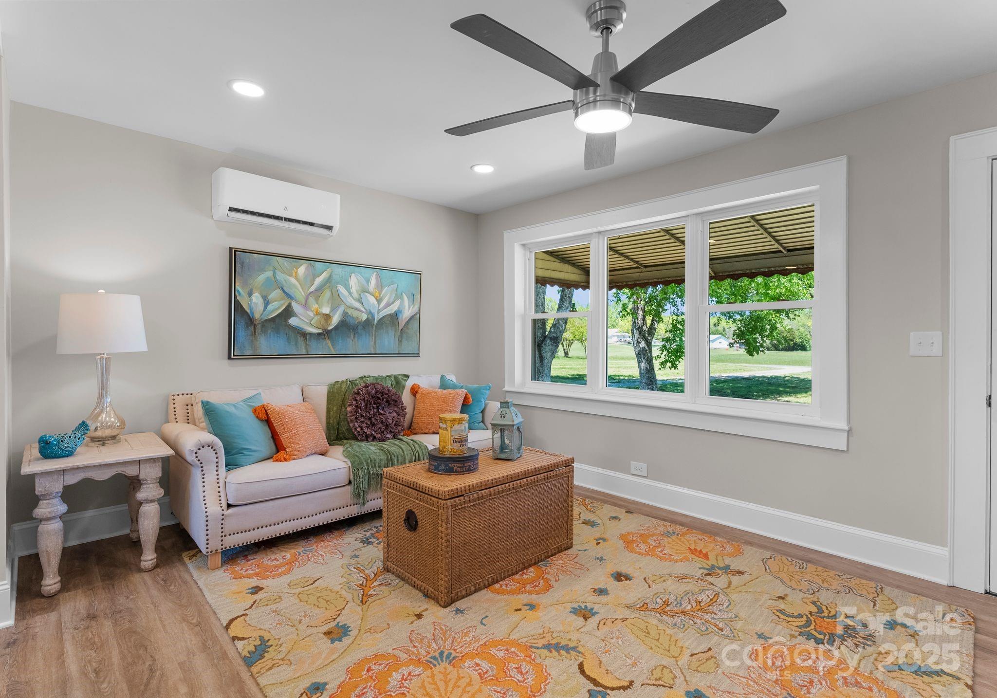 155 Jackson Road Salisbury, NC 28146 - Photo 11 of 26 a living room with furniture and a large window