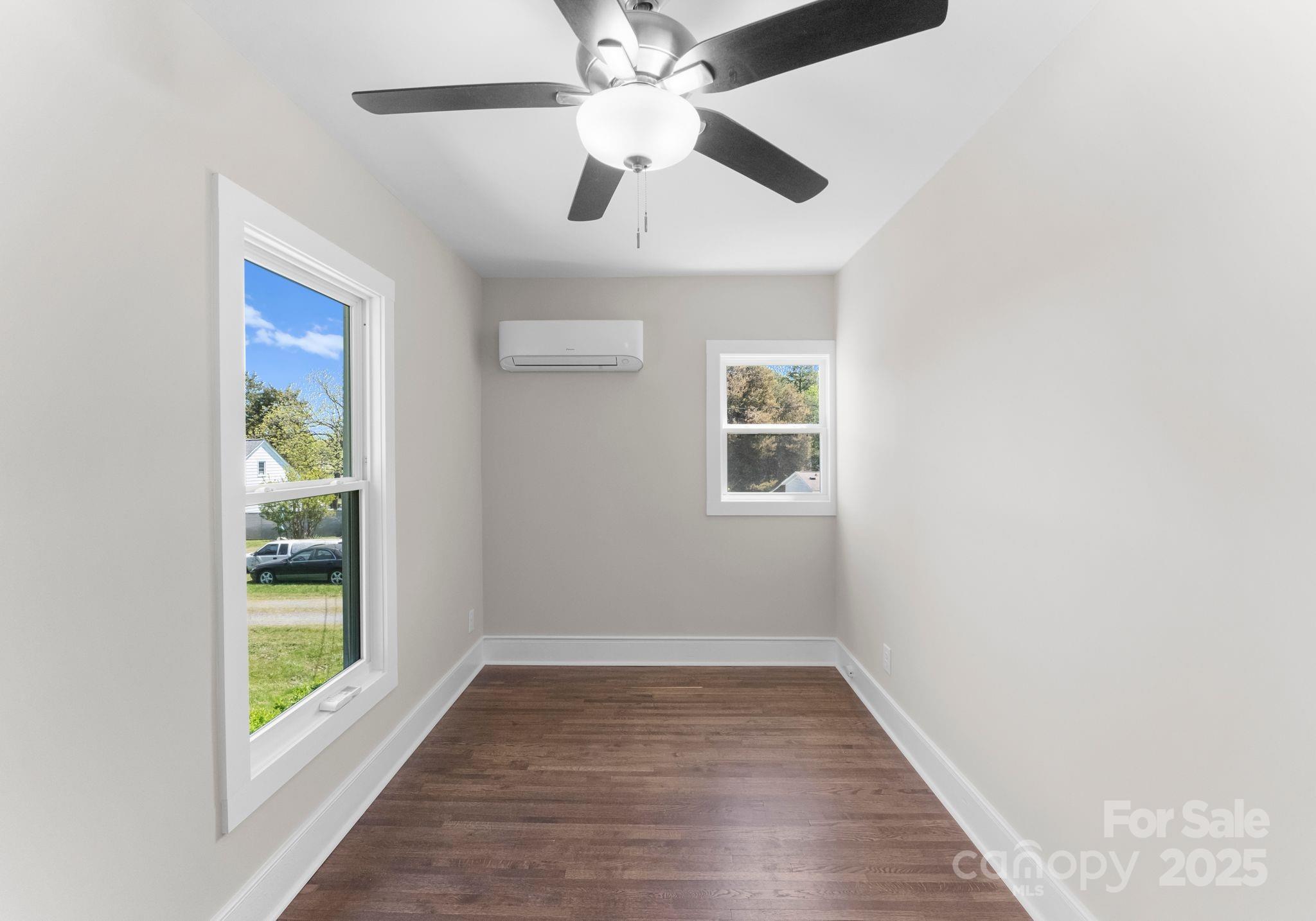 155 Jackson Road Salisbury, NC 28146 - Photo 15 of 26 an empty room with windows and fan