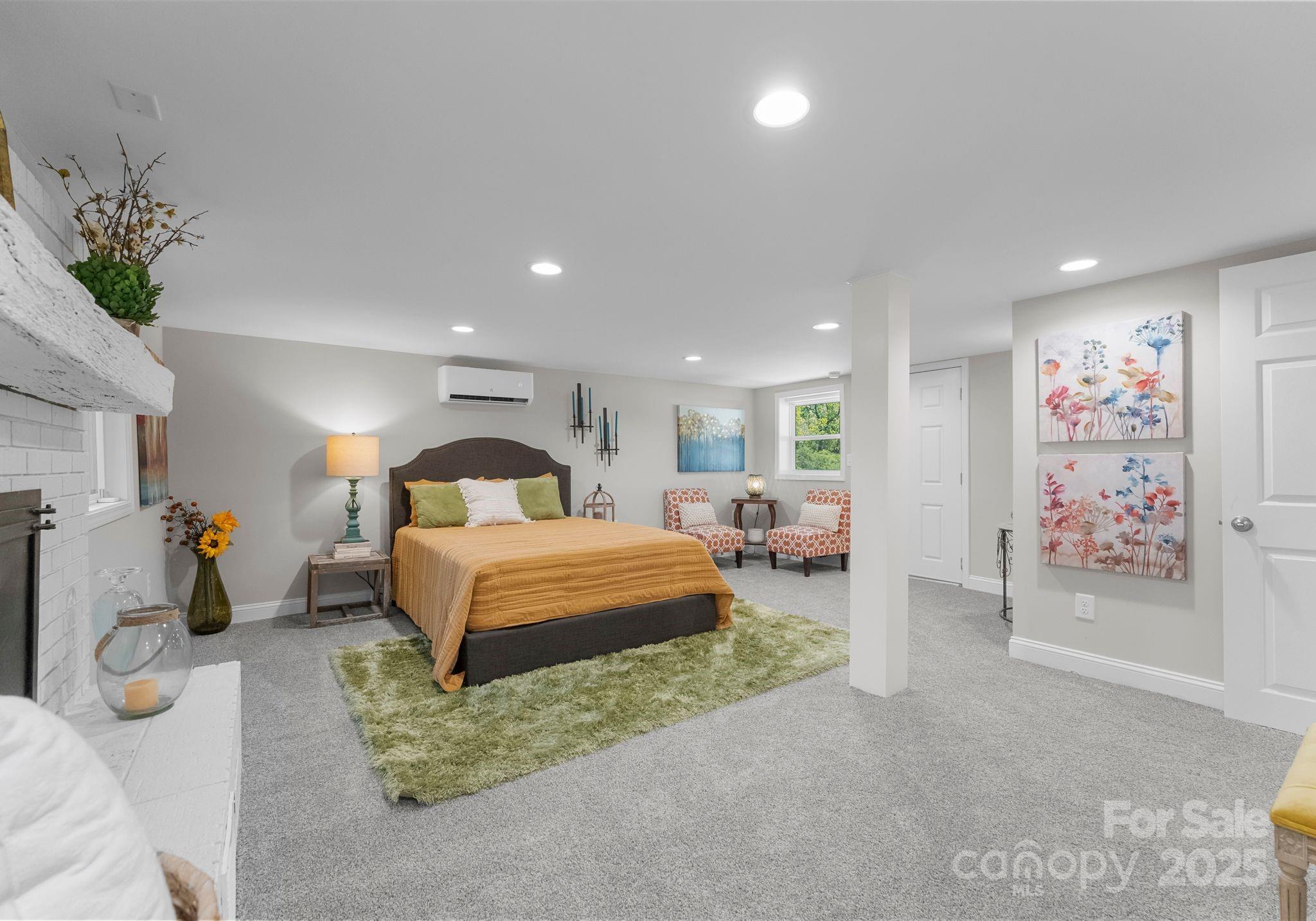 155 Jackson Road Salisbury, NC 28146 - Photo 16 of 26 a bedroom with a bed and a couch