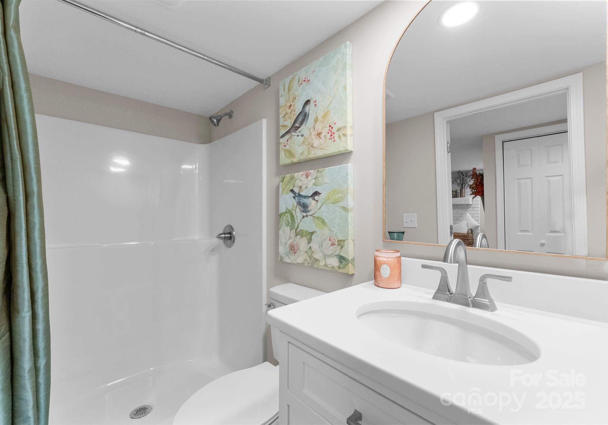 155 Jackson Road Salisbury, NC 28146 - Photo 19 of 26 a bathroom with a sink toilet and shower