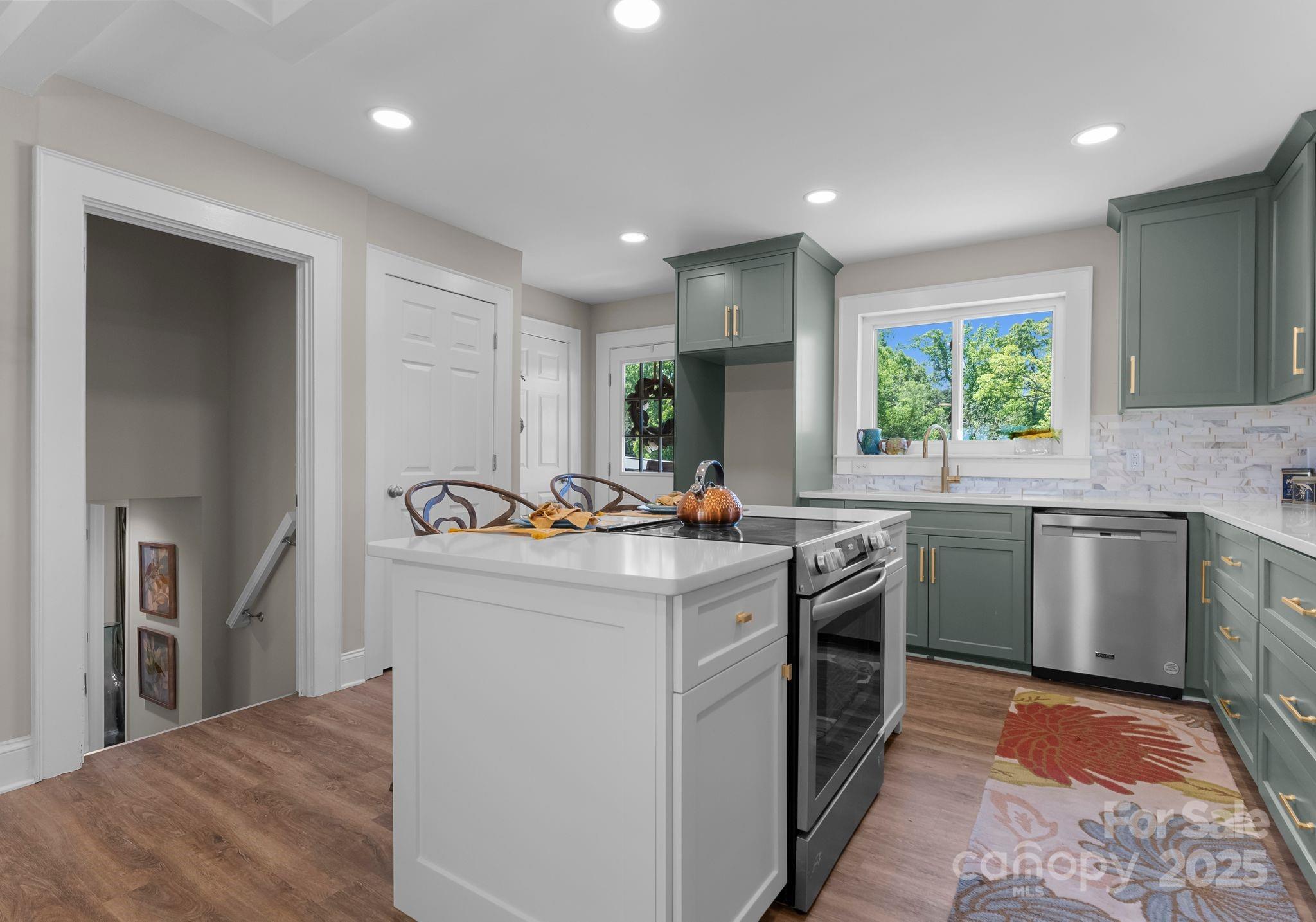 155 Jackson Road Salisbury, NC 28146 - Photo 7 of 26 a kitchen with sink a stove and refrigerator