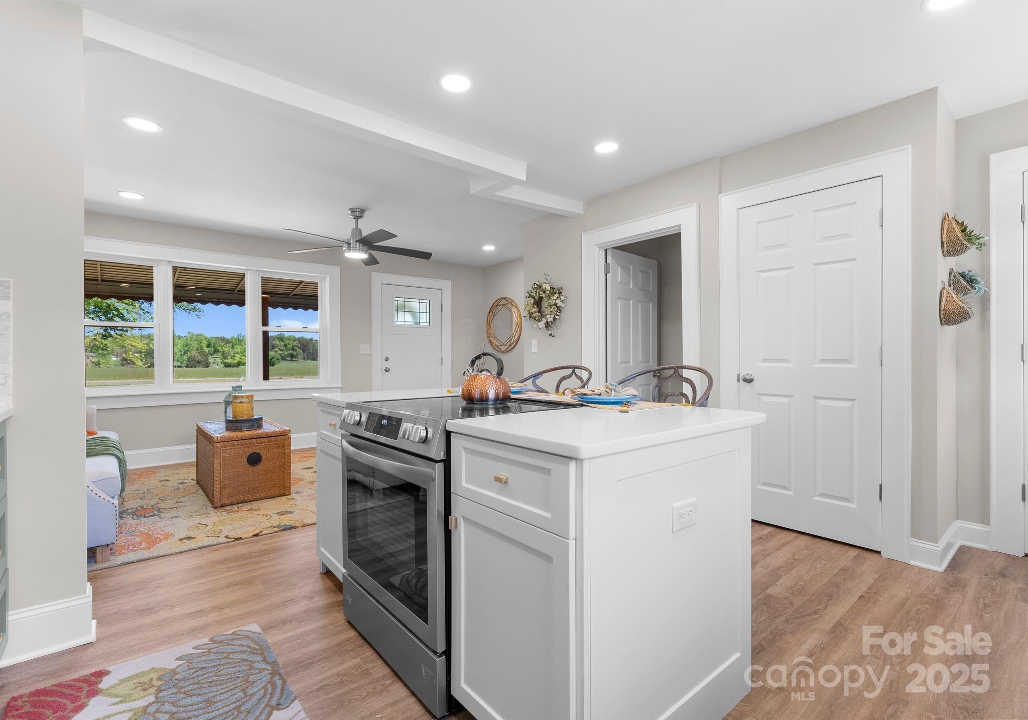 155 Jackson Road Salisbury, NC 28146 - Photo 10 of 26 a kitchen with a sink stove and refrigerator